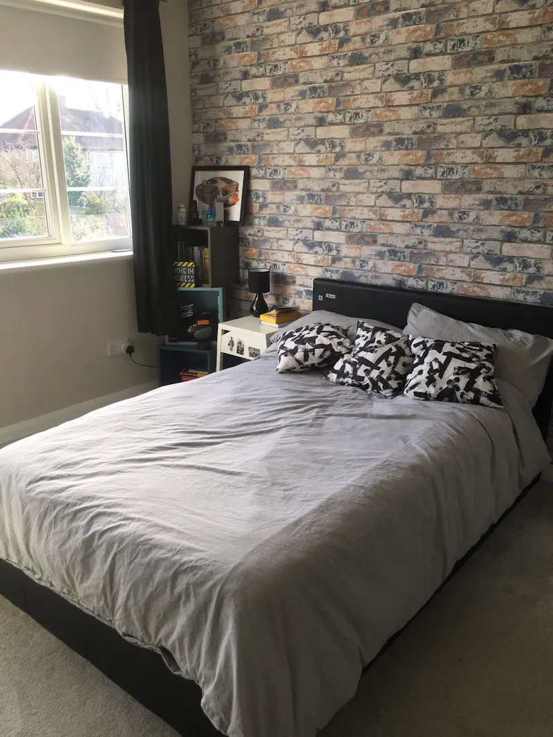 Bedroom at Contemporary Epsom home, D2624 (photo 8)