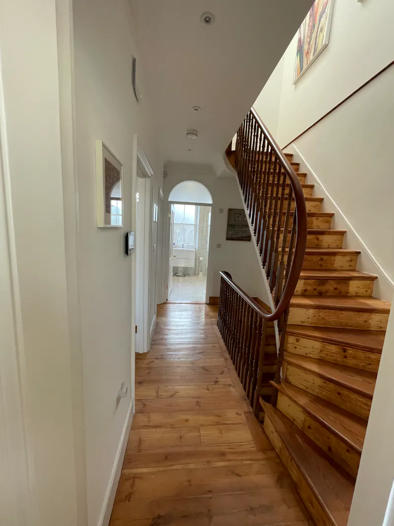 Staircase at Barons Court family home, B1983 (photo 12)