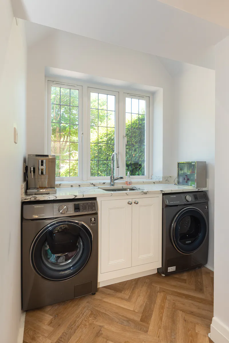 Utility room at Bright family home in Purley, D2650 (photo 17)