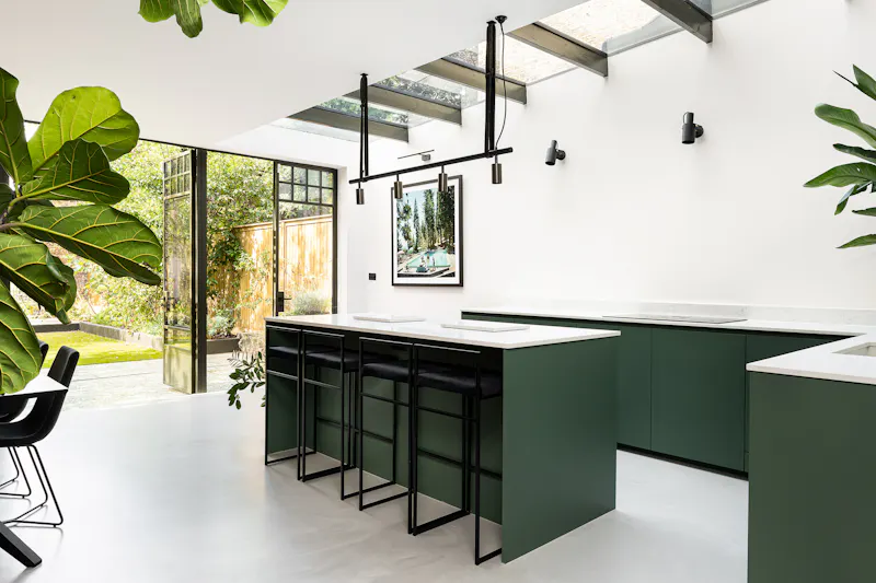 Kitchen island at Stylish Surbiton house, D2662 (photo 9)