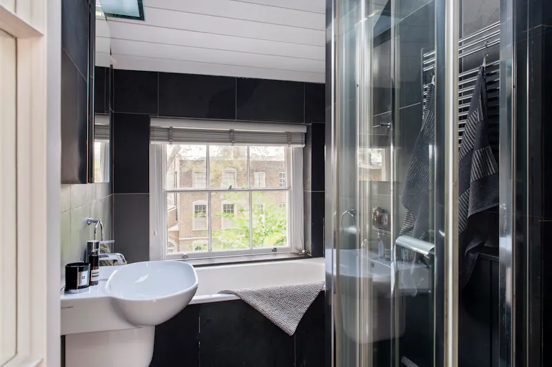 Bathroom at  Bright Denmark Hill apartment, A1594 (photo 13)
