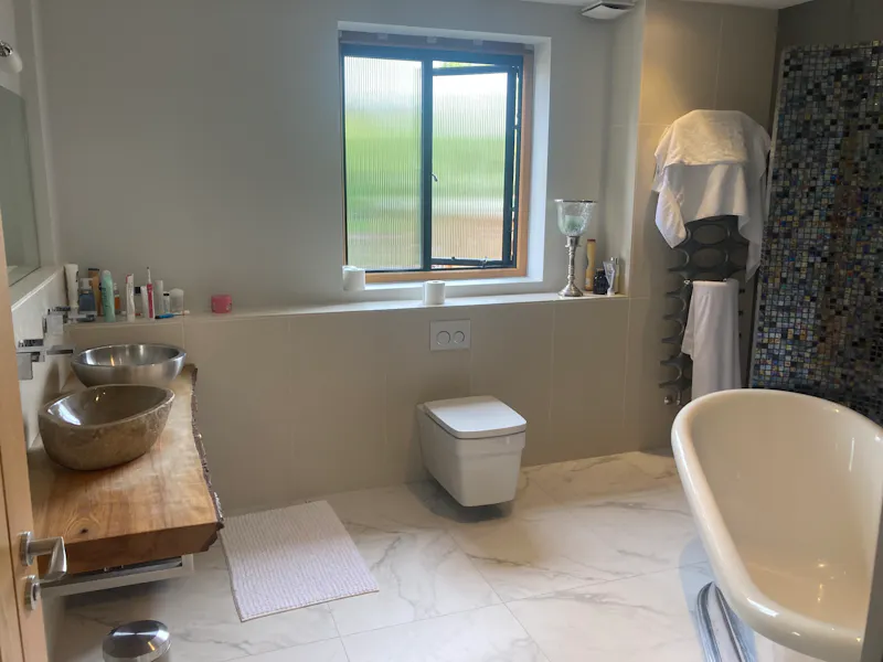 Bathroom at Converted Holmwood barn, L750 (photo 21)