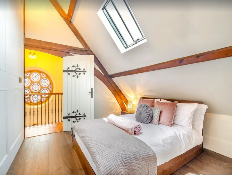 Bedroom at Leeming converted church, B2015 (photo 29)
