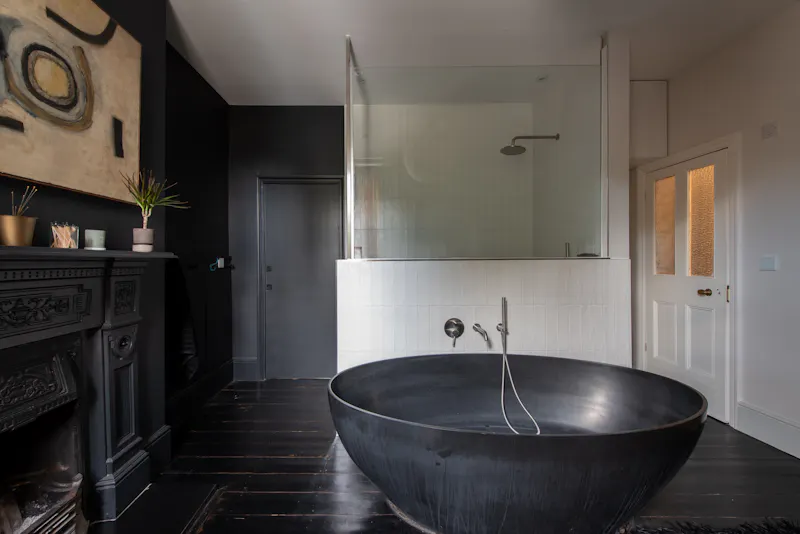 Bathroom at Dark & modern Walthamstow home, E519 (photo 19)