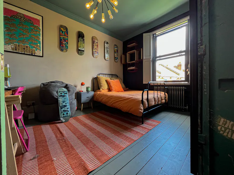 Bedroom at Colourful Catford Villa, B2025 (photo 38)