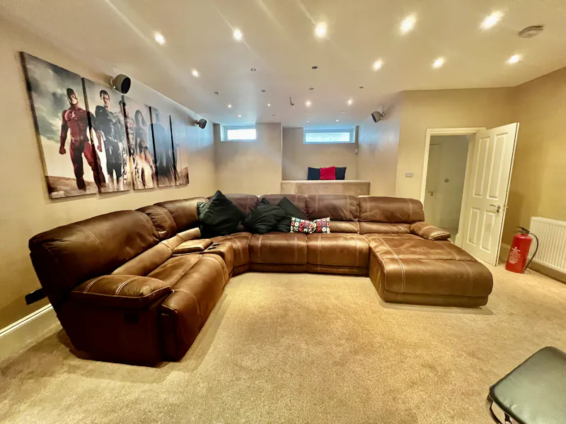 Living Room at Chigwell white stucco home, D2727 (photo 25)