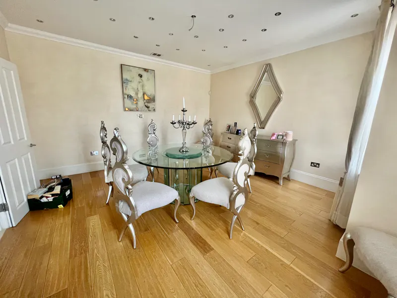 Dining room at Chigwell white stucco home, D2727 (photo 8)