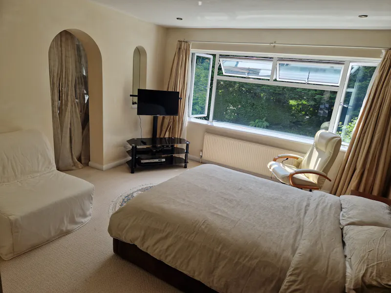 Bedroom at 60s Stanmore suburban home, D2730 (photo 12)