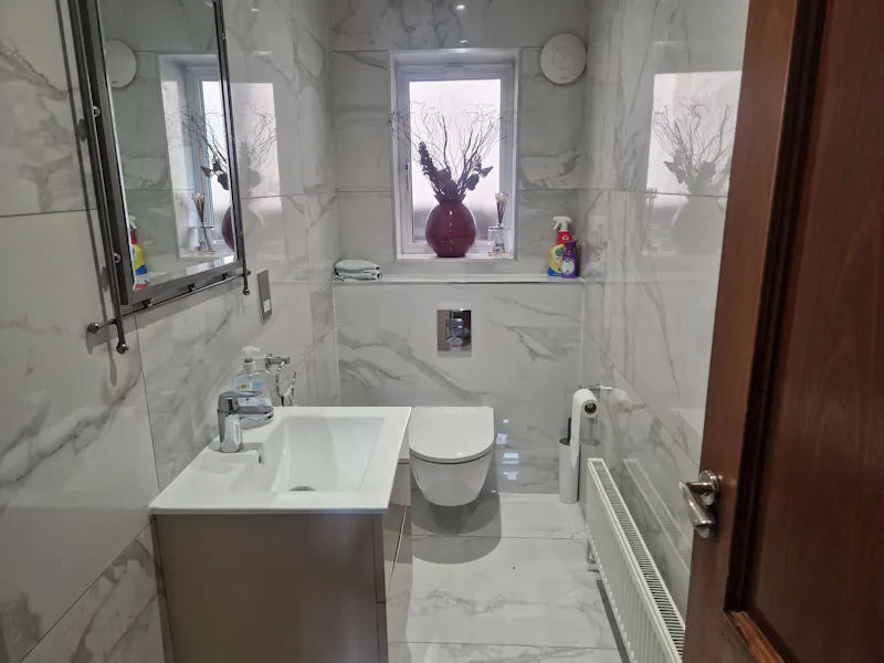 Bathroom at 60s Stanmore suburban home, D2730 (photo 9)