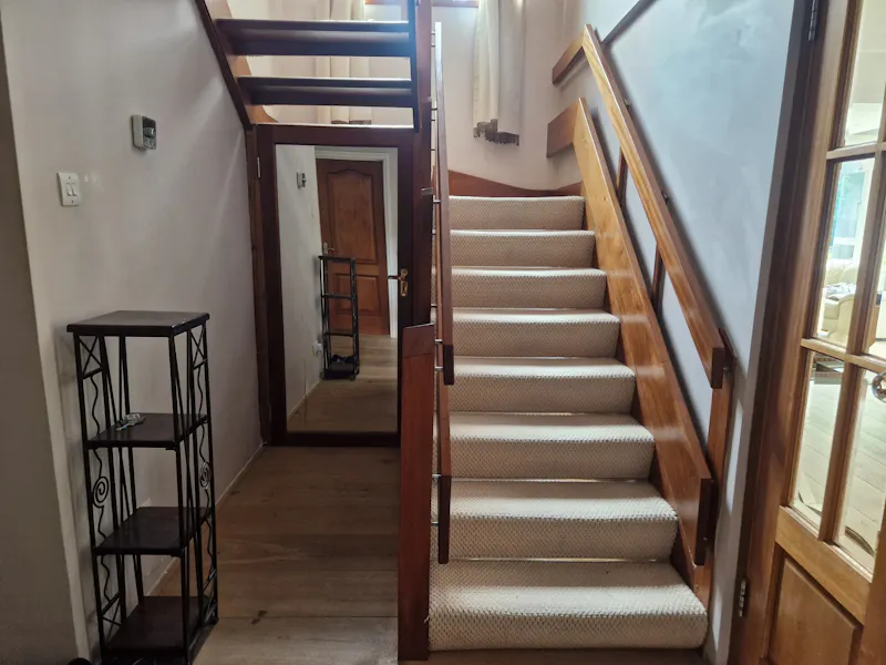 Staircase at 60s Stanmore suburban home, D2730 (photo 10)