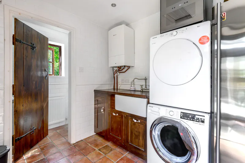 Utility room at Picturesque Woking cottage, C939 (photo 25)