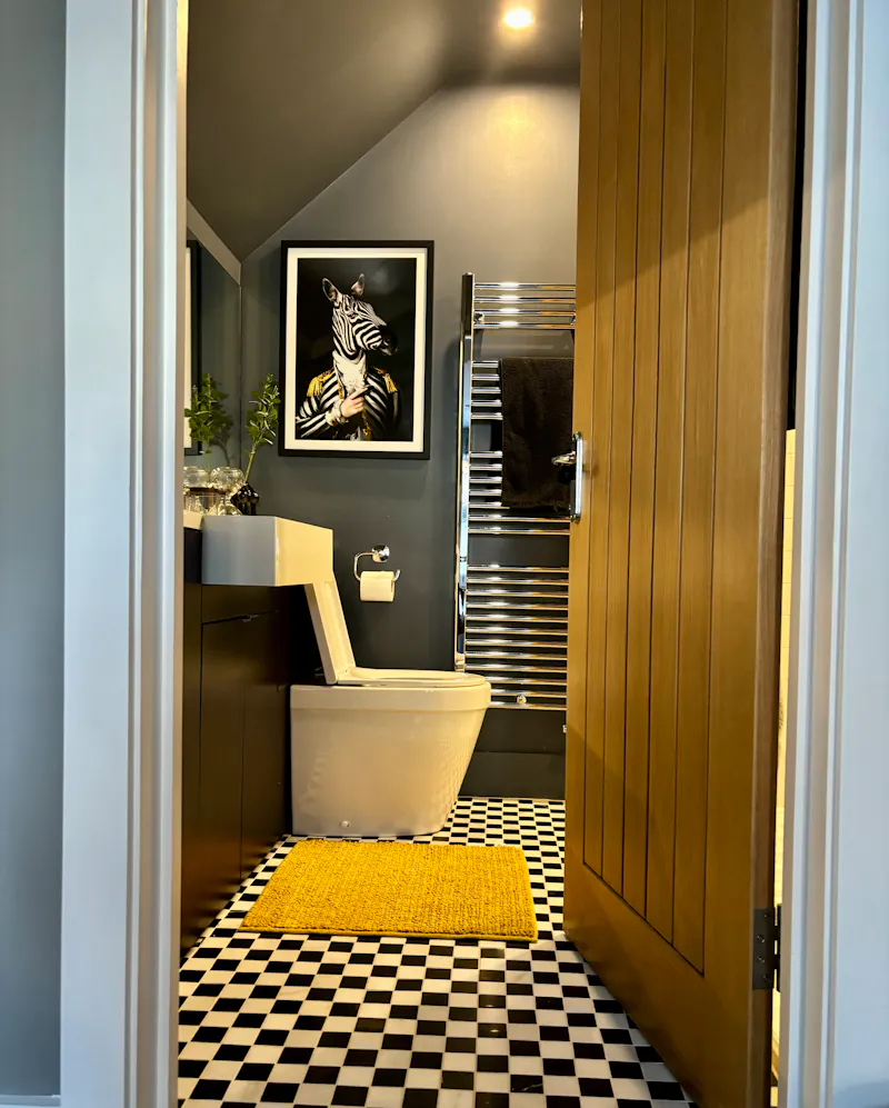 Bathroom at Pretty blue Hersham home, D2754 (photo 13)