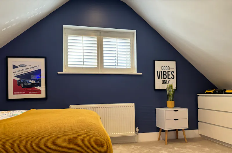 Bedroom at Pretty blue Hersham home, D2754 (photo 10)