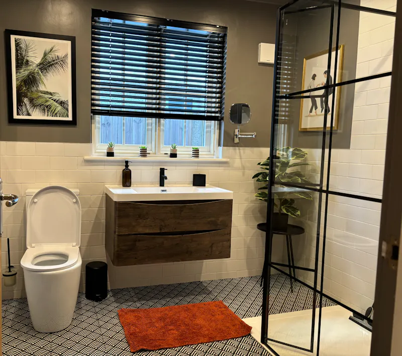 Bathroom at Pretty blue Hersham home, D2754 (photo 14)