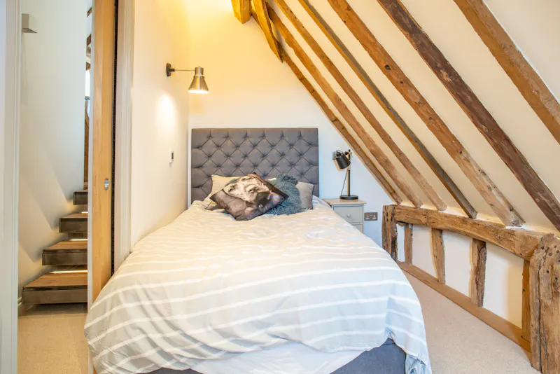 Bedroom at Whempstead barn conversion, D2750 (photo 35)