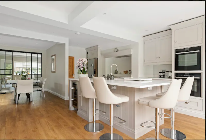 Kitchen island at Light Totteridge family home, D2237 (photo 5)