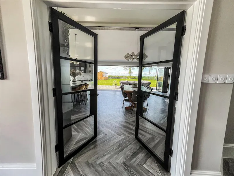 French doors at Modern-Build Bungalow Selmeston, D2789 (photo 11)