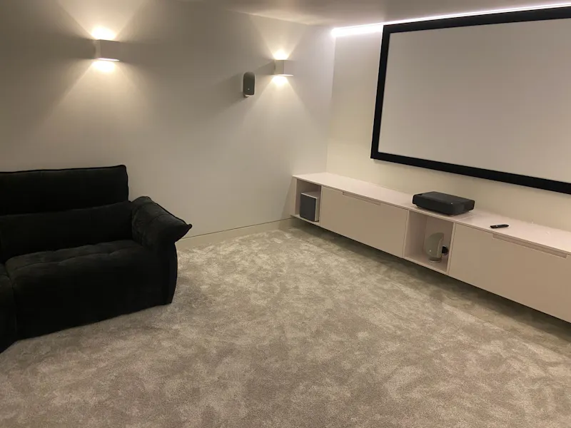 Home cinema at Eye-catching Architectural Home, D2799 (photo 19)