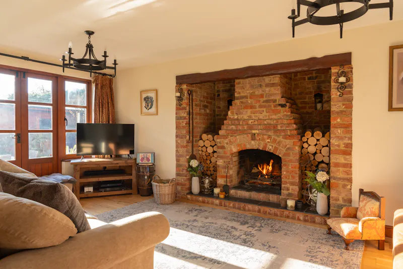 Fireplace at Cosy Surrey Cottage, C947 (photo 3)