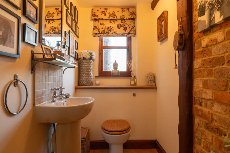 Exposed brick at Cosy Surrey Cottage, C947 (photo 19)