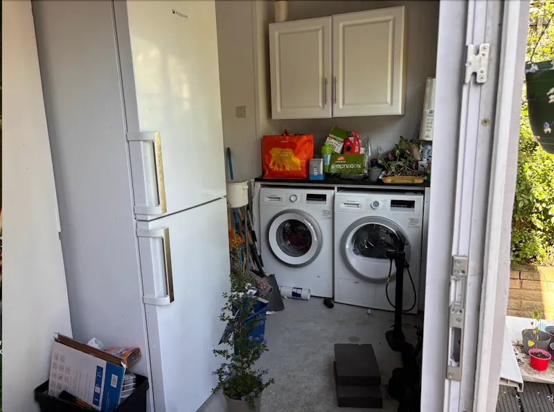 Utility room at Catford family home, B2085 (photo 15)