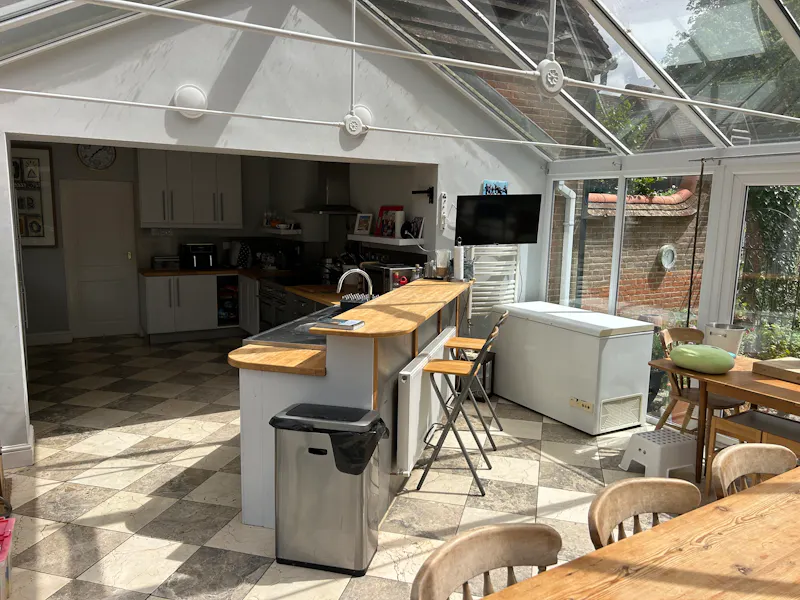 Kitchen island at 1920s Coach House in Tring , B2083 (photo 17)