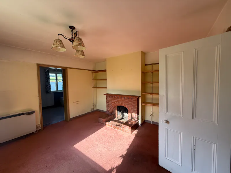 Fireplace at Ellastone Groundskeeper Cottage, A1669 (photo 3)