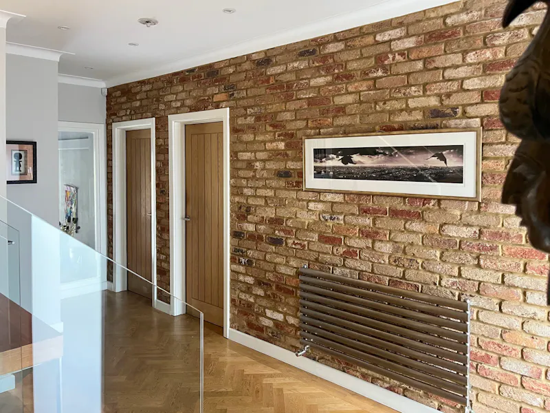 Exposed brick at Modern Crystal Palace home, D2835 (photo 18)