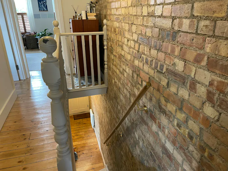 Staircase at Earthy Walthamstow terrace home, B2092 (photo 13)
