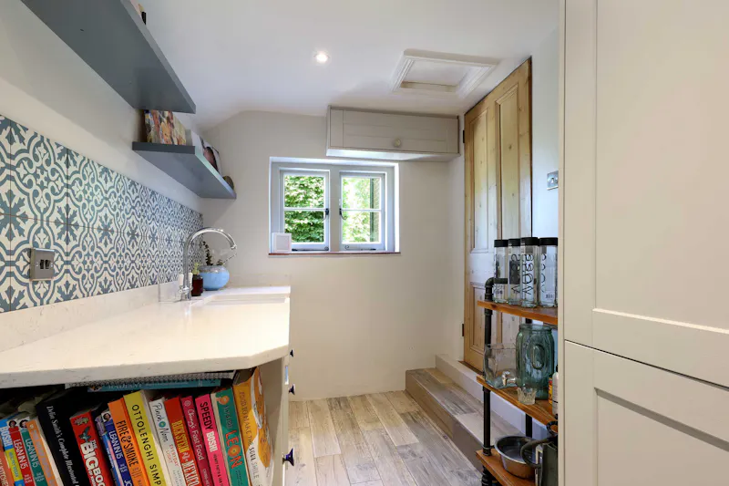 Utility room at Beautiful Farnham farmhouse, A1679 (photo 10)