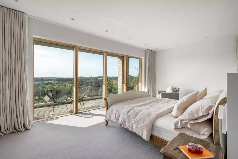Bedroom - main at Modern hillside house Frensham, K517 (photo 12)