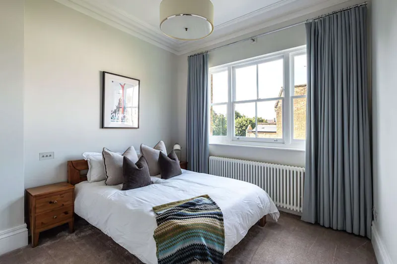 Bedroom at Stylish Wandsworth family home, B2128 (photo 12)