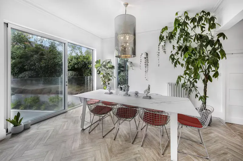 Dining room at Sleek Victorian Altrincham Home, B2130 (photo 5)