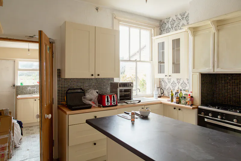 Kitchen island at Vacant Malden Victorian house, B2141 (photo 11)