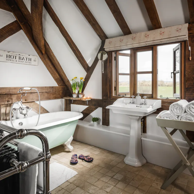 Bath - rolltop at Whimsical Chocolate Box Cottage, C967 (photo 18)