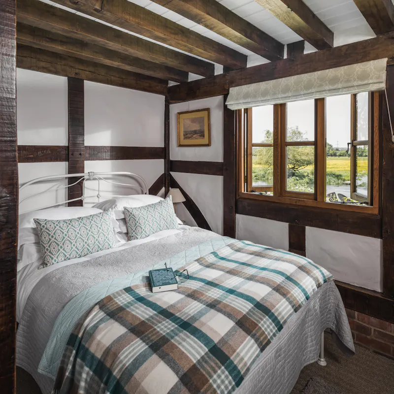 Bedroom at Whimsical Chocolate Box Cottage, C967 (photo 19)