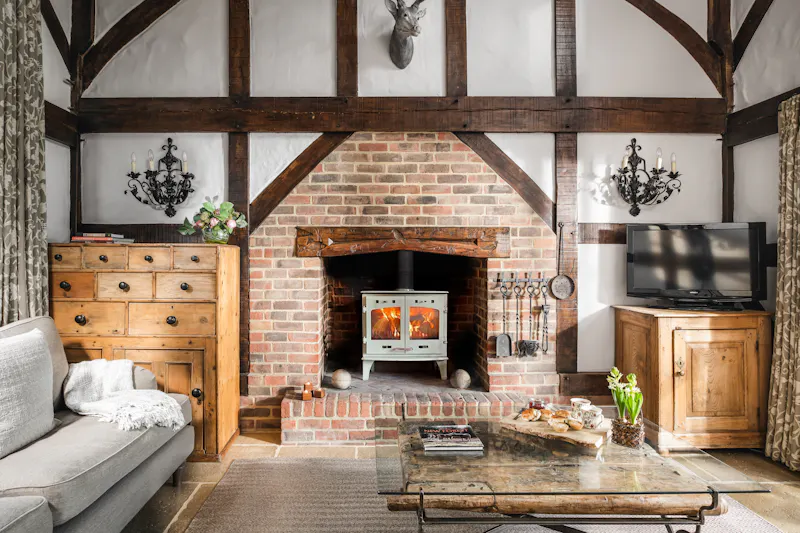 Fireplace at Whimsical Chocolate Box Cottage, C967 (photo 6)