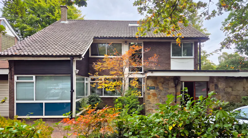Front Exterior at Mid-century Hampstead Home, D2914 (photo 1)